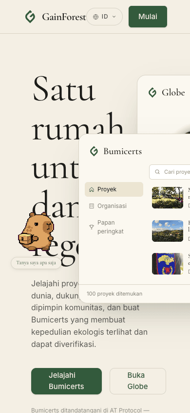 Mobile hero before — 78px headline overflows, Bumicerts card spills off the right edge, Globe card off-screen, no nav menu.